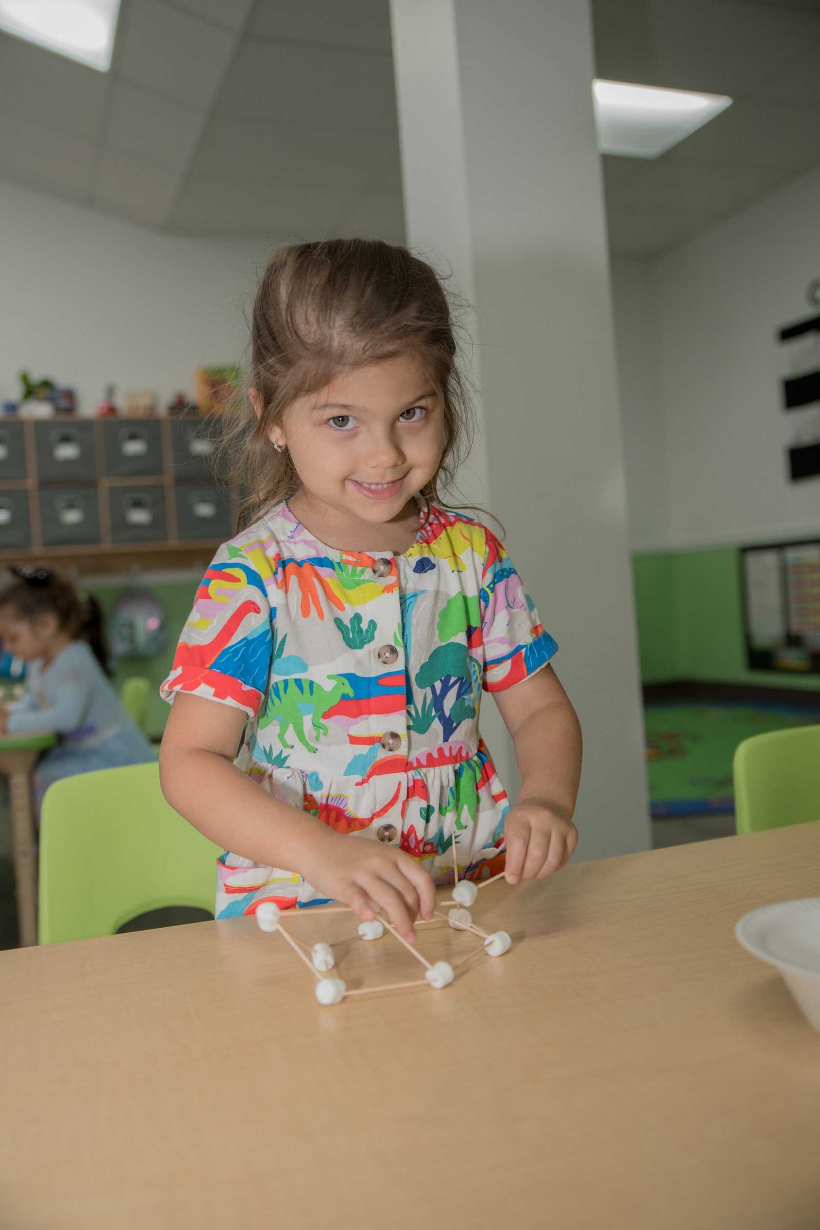 A child creating art at MyPlace in Katy, TX