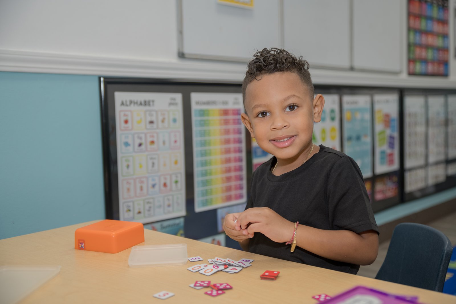 A teacher guiding hands-on play at MyPlace in Katy, TX