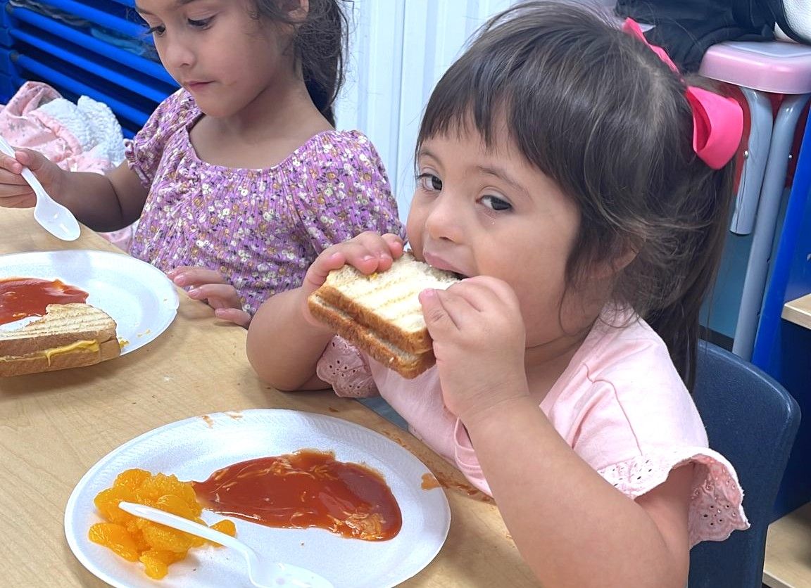 Children enjoying a healthy lunch at MyPlace