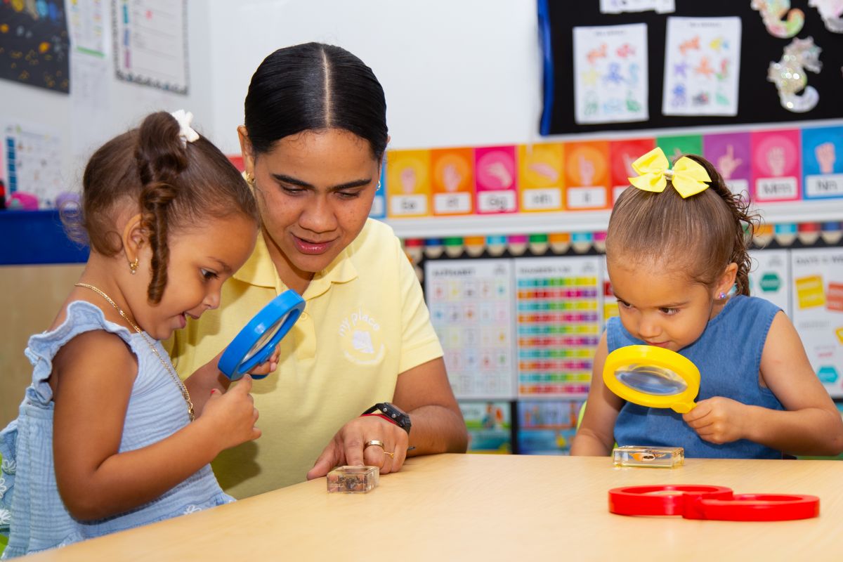 A teacher and preschoolers discovering together at MyPlace, Katy TX